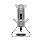 Clear glass water pipe with metallic top on a white background