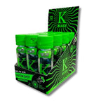 Display of Kratom shots with green and black packaging featuring the brand 'K Blast'.