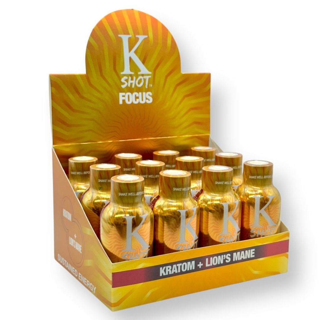 Display of K Shot Focus bottles with a prominent 'K' logo on a white background